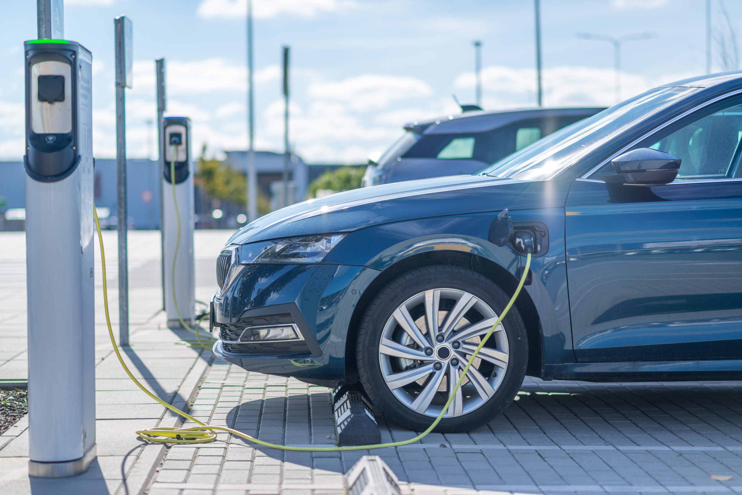 Electric car charging at a station EV Charger Installation Service